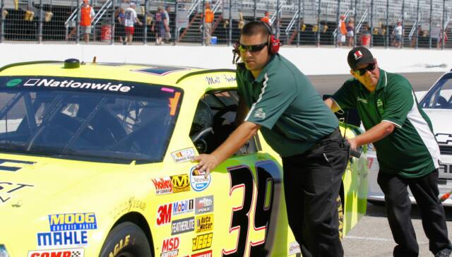 Go Green Racing crew with the number 39 car